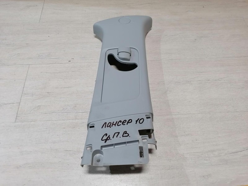 Lancer 10 №1 обшивка средней стойки верхняя правая