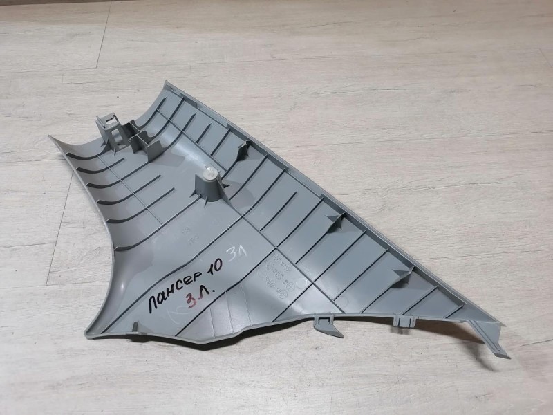 Lancer 10 №1 обшивка задней стойки верхняя левая