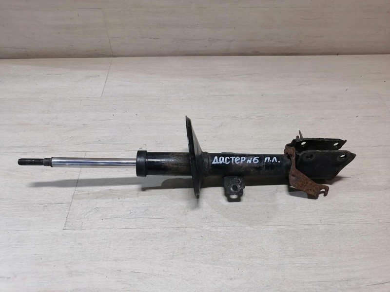 Duster №6 амортизатор передний