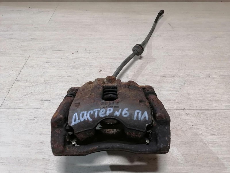 Duster №6 суппорт левый