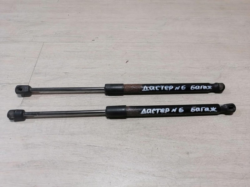 Duster №6 амортизатор крышки багажника