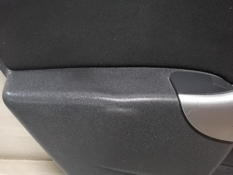 Duster №6 обшивка двери задняя левая деф