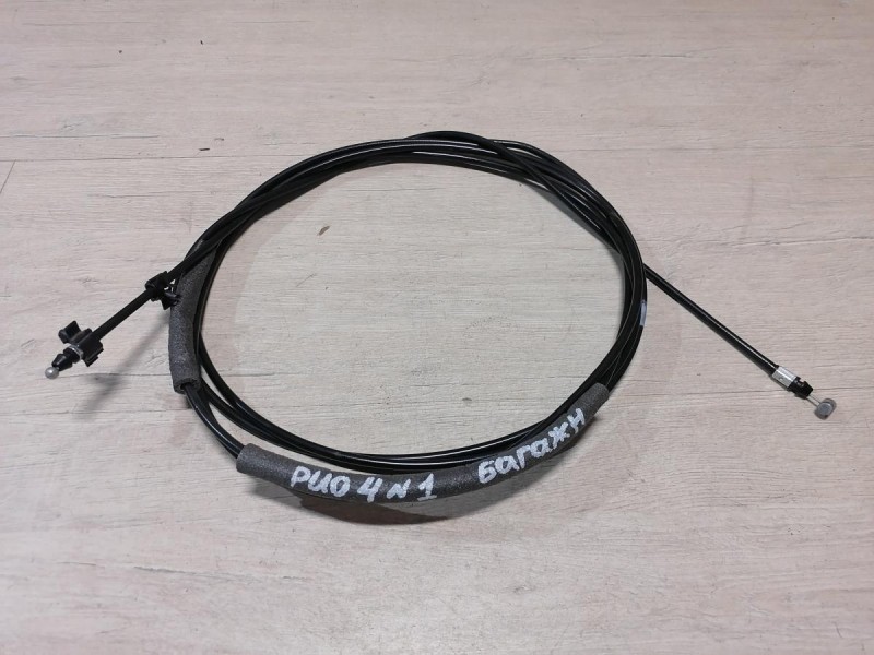 Rio 4 №1 трос багажника