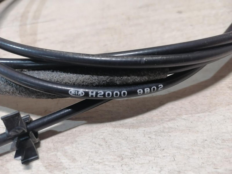 Rio 4 №1 трос багажника