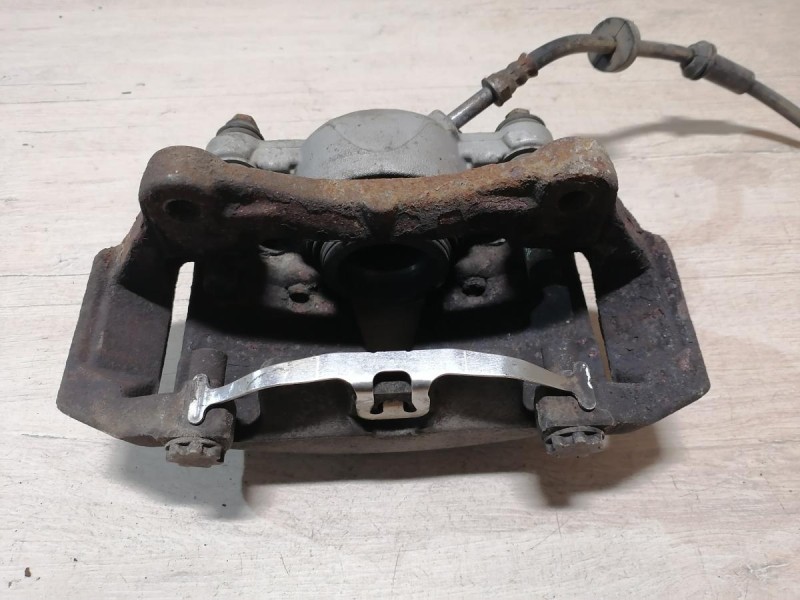 Audi A6 C7 суппорт тормозной передний левый