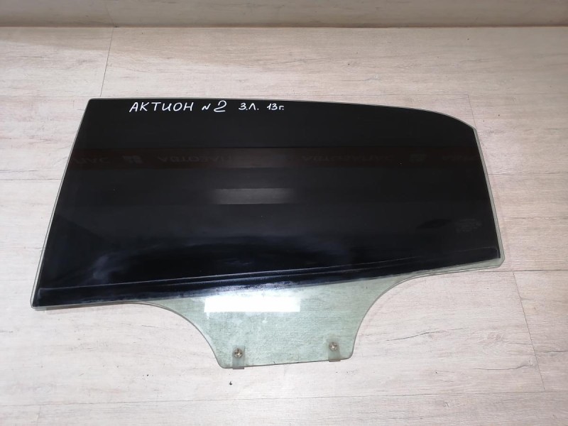 Actyon №2 стекло заднее левое 13