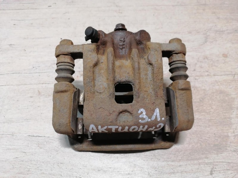 Actyon №2 суппорт задний левый