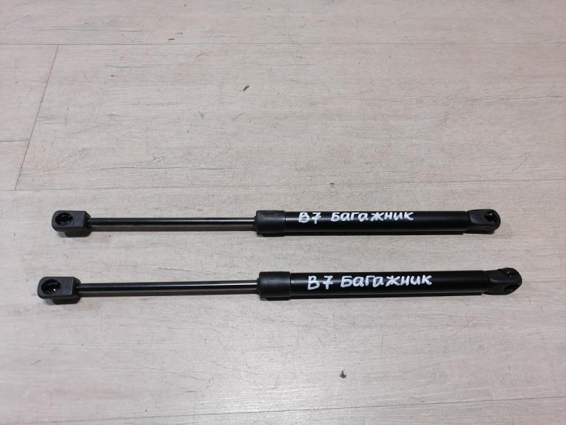 Passat B7 амортизатор крышки багажника