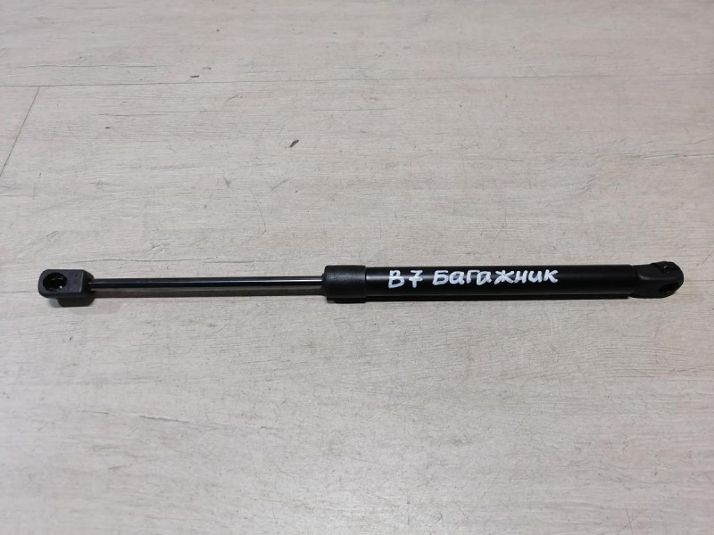 Passat B7 амортизатор крышки багажника