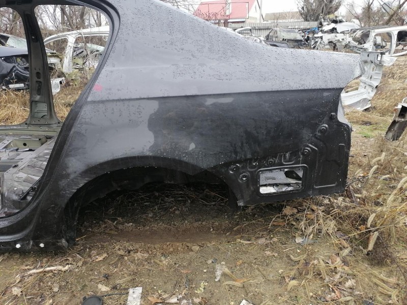 Passat B7 крыло заднее левое