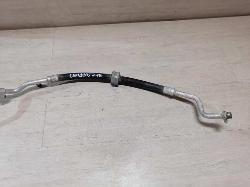 Sandero №18 трубка кондиционера толстая длинная 924804175