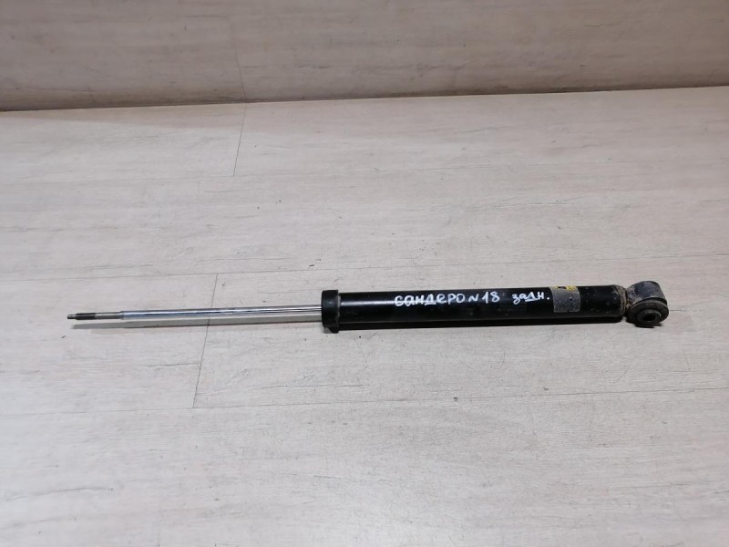 Sandero №18 амортизатор задний деф не ориг