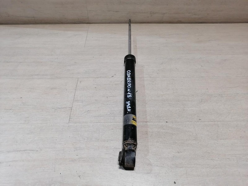 Sandero №18 амортизатор задний деф не ориг