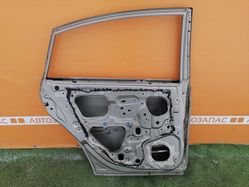 Almera G15 №12 дверь задняя левая деф