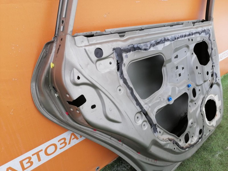 Almera G15 №12 дверь задняя левая деф