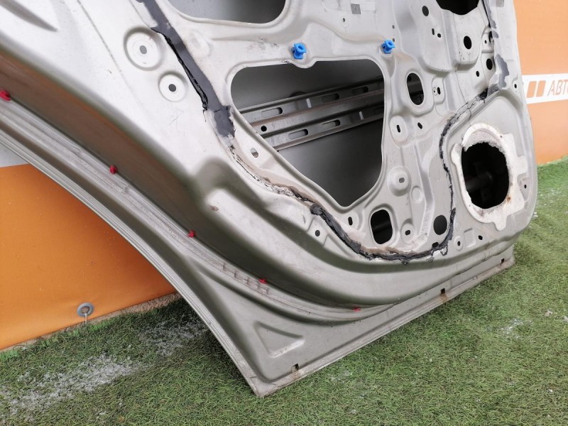 Almera G15 №12 дверь задняя левая деф