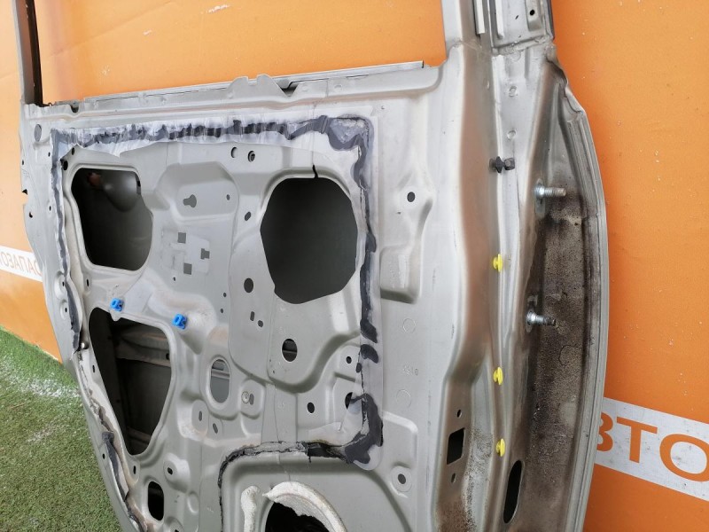 Almera G15 №12 дверь задняя левая деф