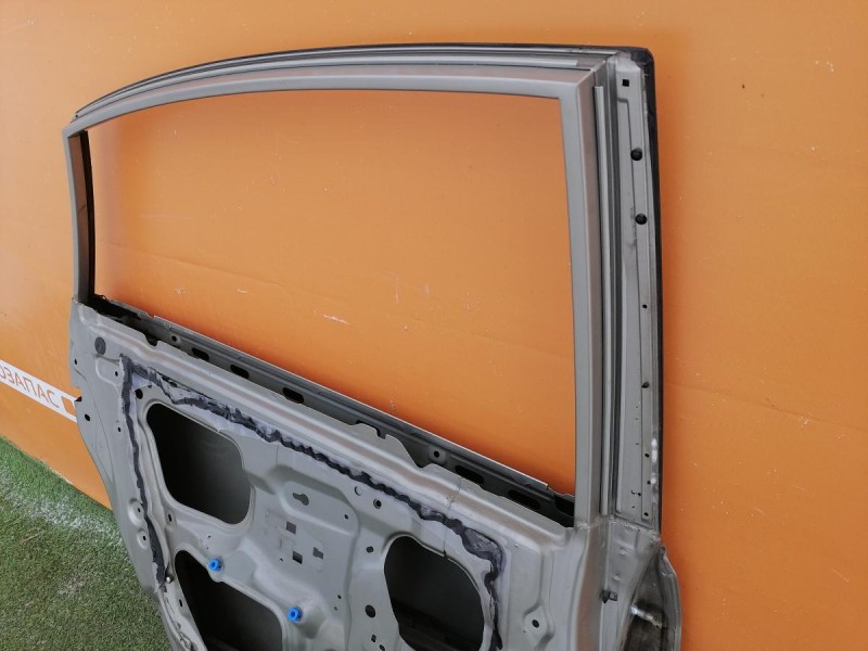 Almera G15 №12 дверь задняя левая деф