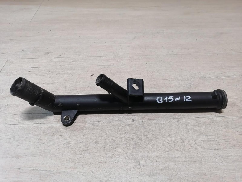 Almera G15 №12 трубка охлаждения двигателя на помпу 16кл K4M