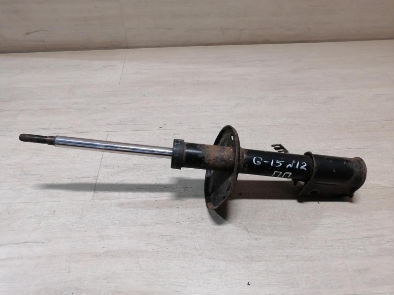 Almera G15 №12 амортизатор передний