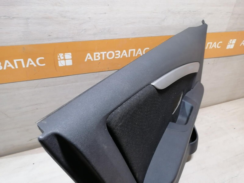 Almera G15 обшивка двери передняя левая эл