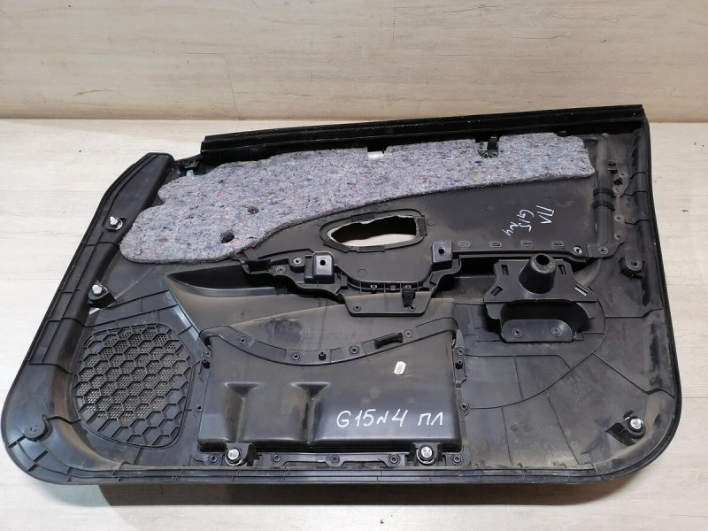 Almera G15 обшивка двери передняя левая эл