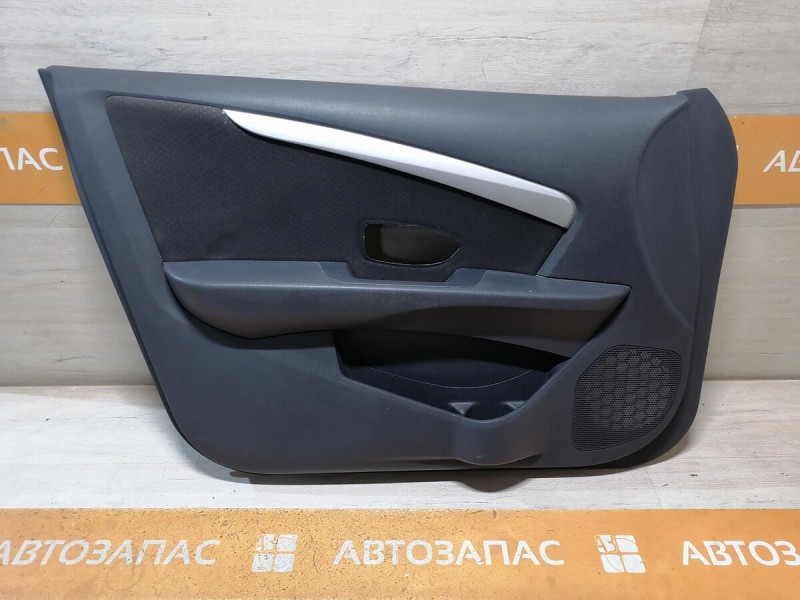 Almera G15 обшивка двери передняя левая эл