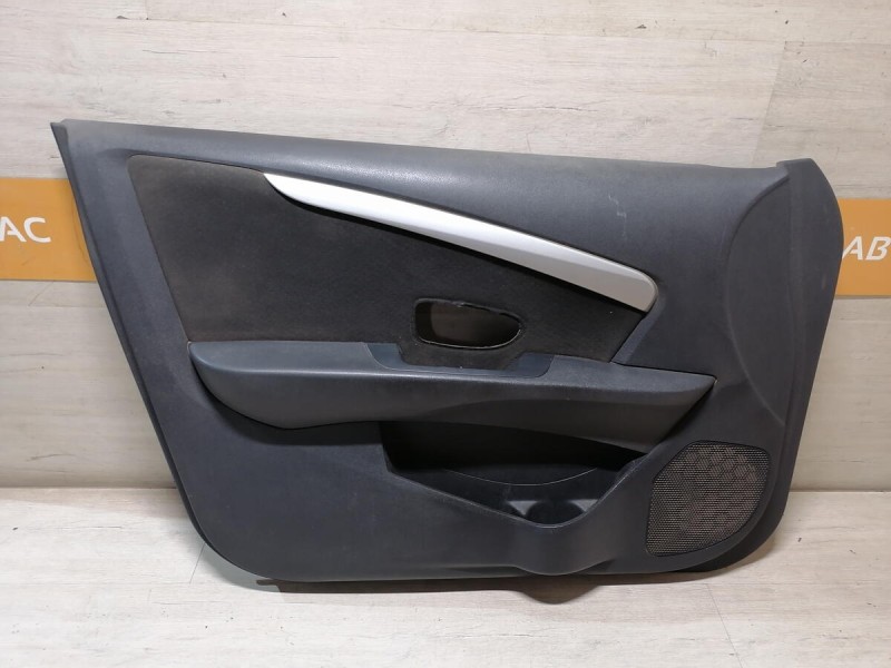 Almera G15 обшивка двери передняя левая эл