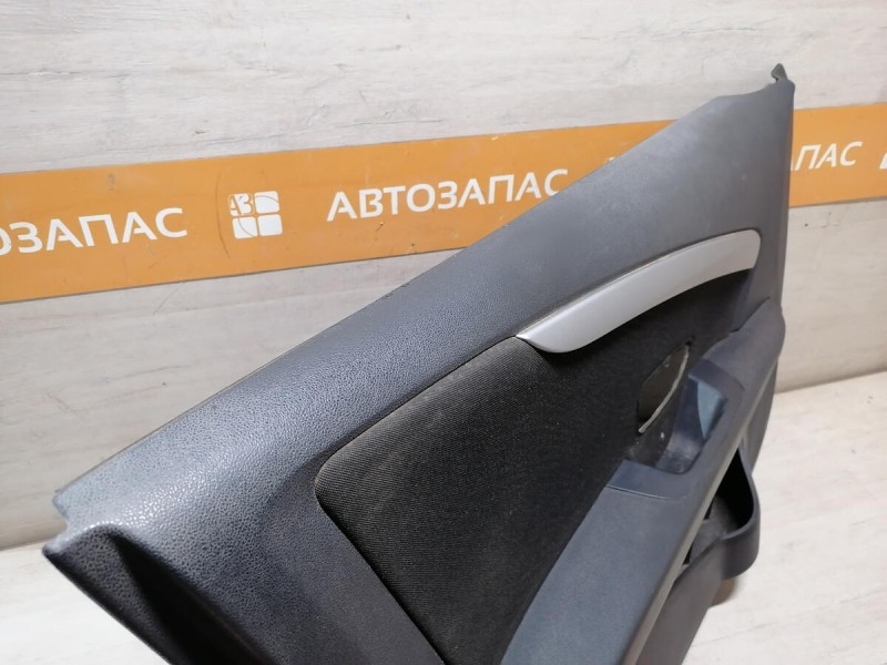 Almera G15 обшивка двери передняя левая эл