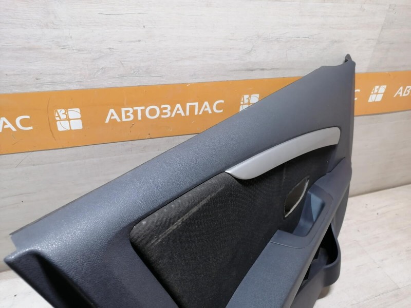 Almera G15 обшивка двери передняя левая эл
