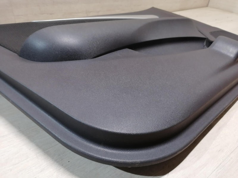 Almera G15 обшивка двери передняя левая эл