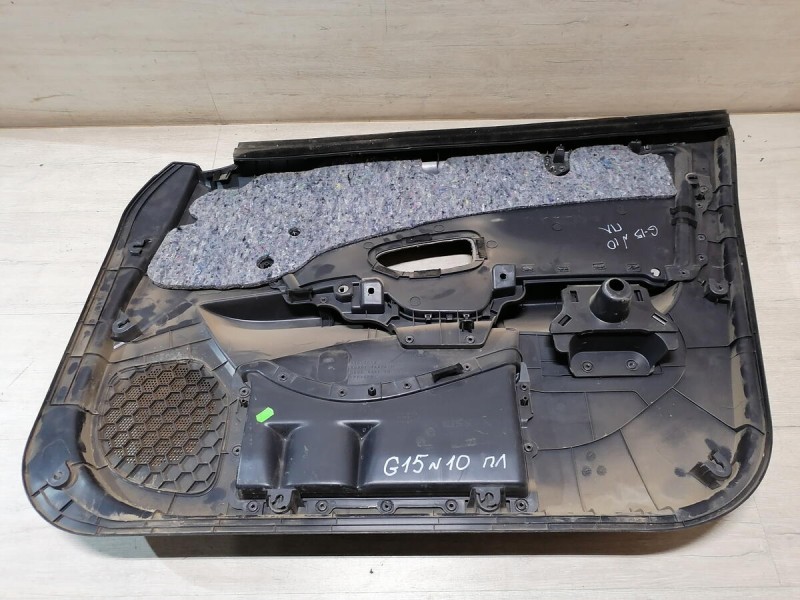 Almera G15 обшивка двери передняя левая эл