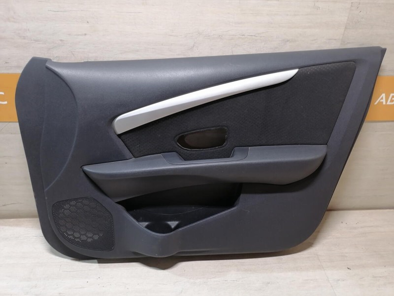 Almera G15 обшивка двери передняя правая эл