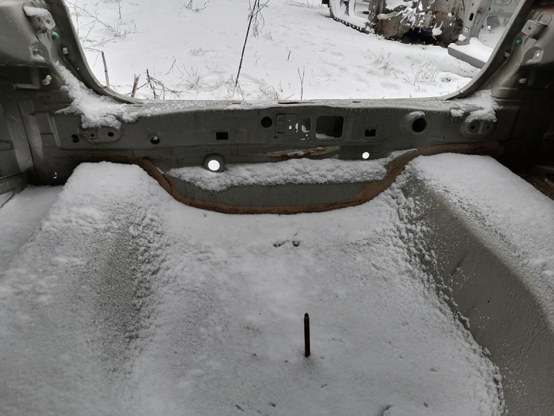 Almera G15 №12 панель задняя ниша под запаску