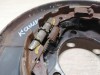 Qashqai №5 комплект ручника и кожух тормозного диска задний левый