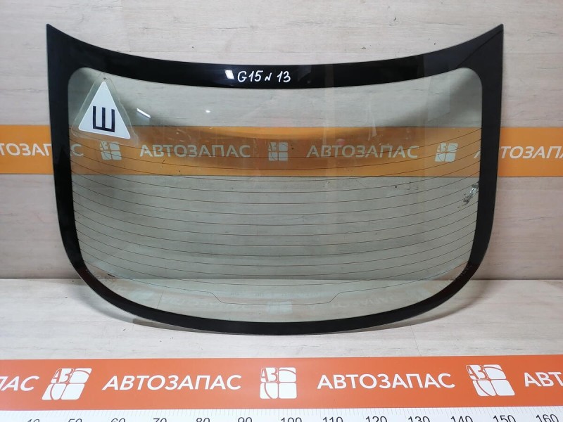 Almera G15 №13 стекло заднее