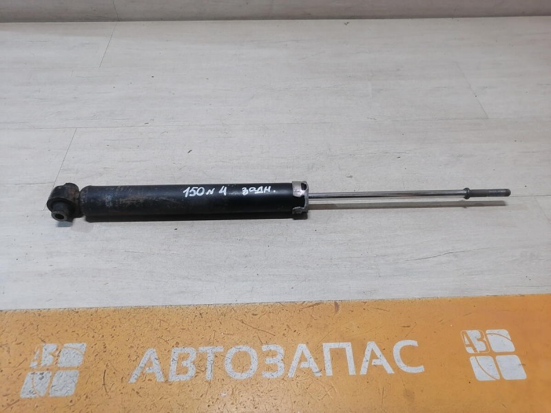 Corolla амортизатор задний